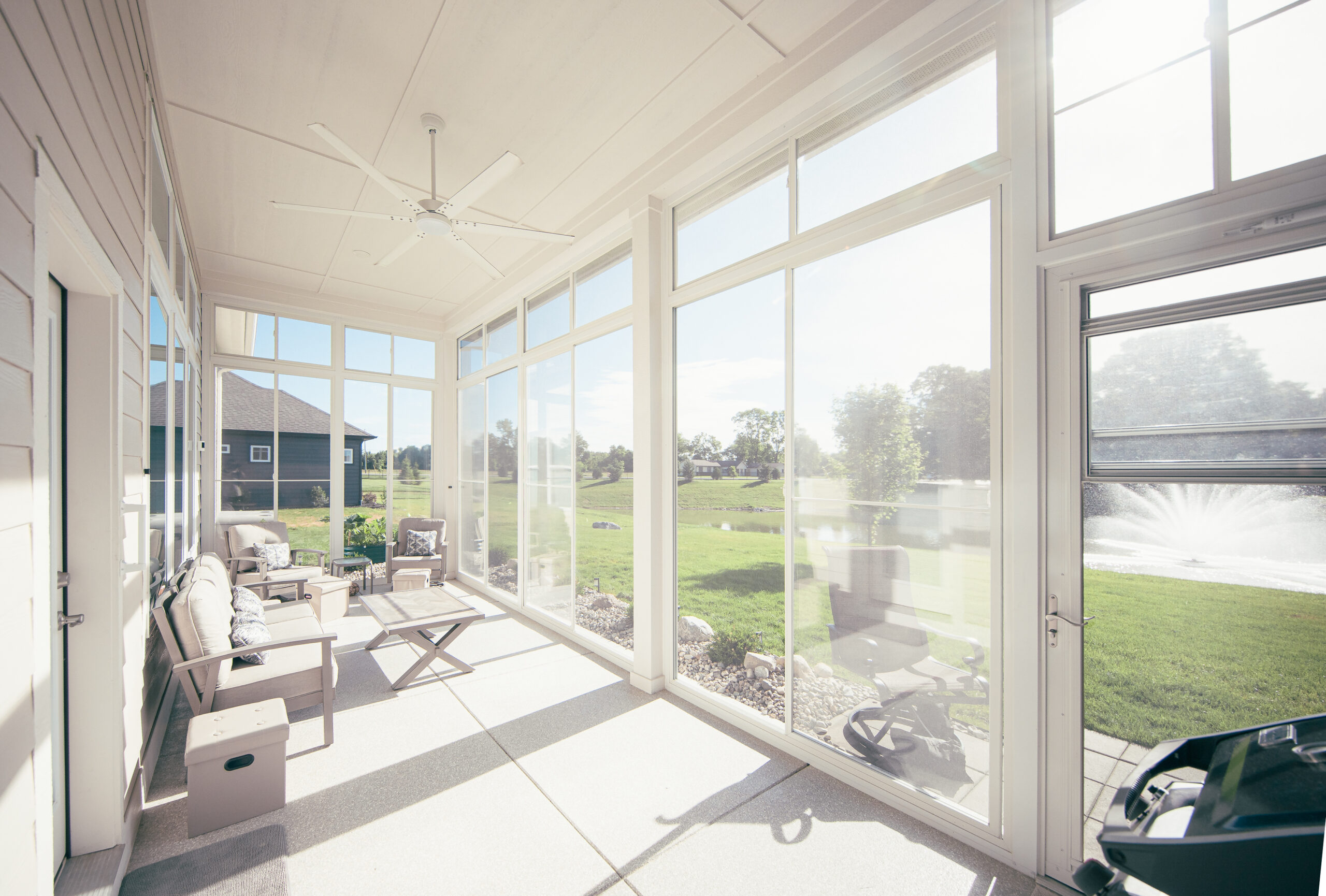 The Covey project, an enclosed porch with Porch Conversions screen and vinyl windows