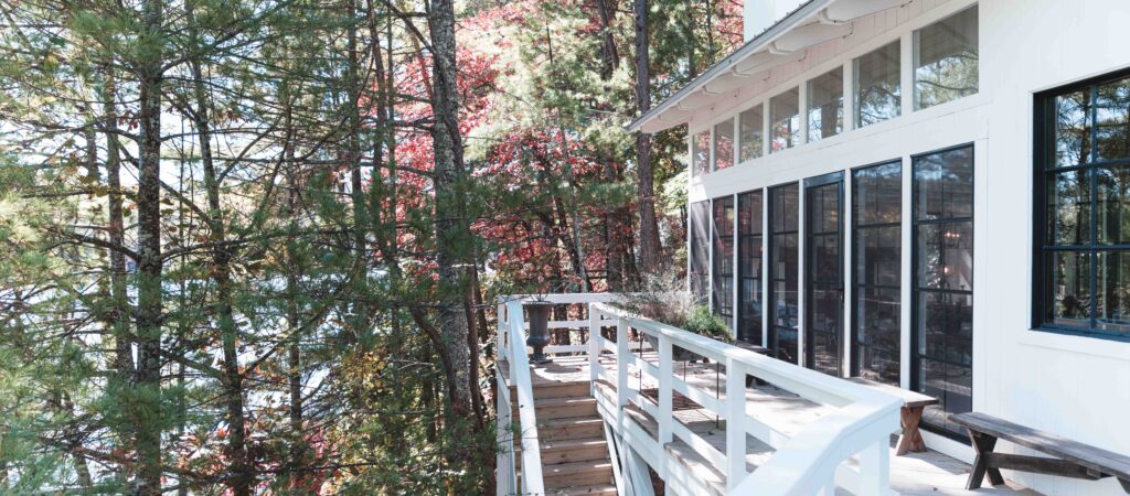 A raised porch enclosure among the trees